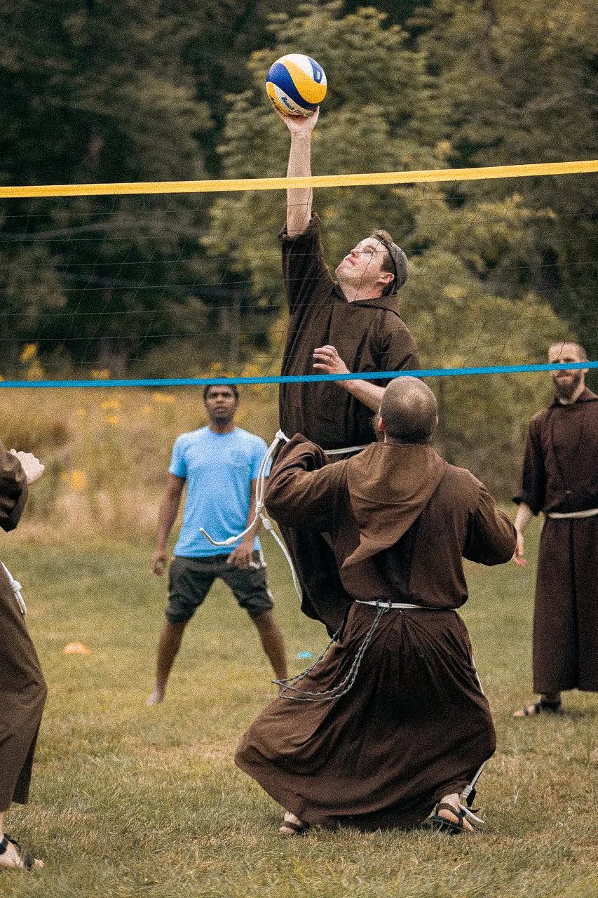 Capuchin Friars playing volleyball