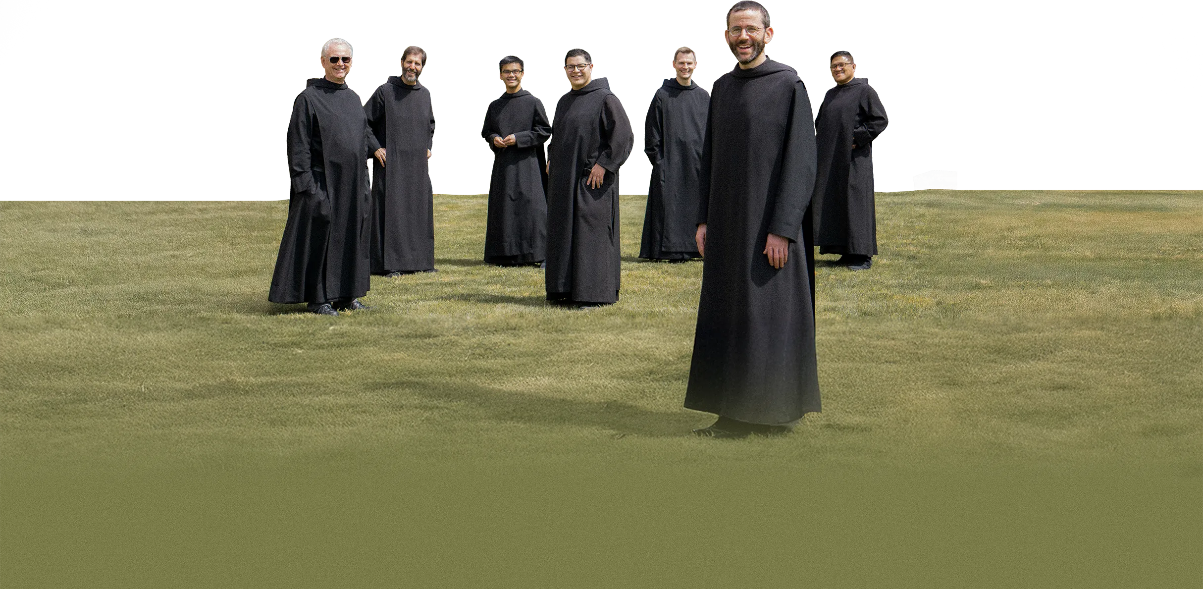 Benedictine Monks standing in field